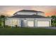 This is a gorgeous two-story home with a large front yard and an attached two-car garage at 5242 Handsome Hills Dr, Mount Dora, FL 32757