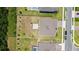 Aerial view of a house with a large backyard and lush landscaping at 5264 Obsidian Gate Dr, Mount Dora, FL 32757