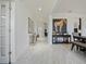 Spacious hallway with marble flooring, elegant decor, and high ceilings at 5264 Obsidian Gate Dr, Mount Dora, FL 32757