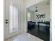View of a home office featuring dark hardwood flooring, modern decor, and ample natural light at 5264 Obsidian Gate Dr, Mount Dora, FL 32757