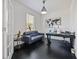 Comfortable home office with a modern sofa, stylish desk, and elegant decor at 5264 Obsidian Gate Dr, Mount Dora, FL 32757