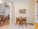 Second dining room with tile floors and a view to a more formal dining space at 5353 Red Leaf Ct, Oviedo, FL 32765