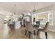 Bright kitchen features a cozy breakfast nook and a view of the kitchen island at 5451 Los Palma Vista Dr, Orlando, FL 32837