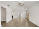 Open living room boasts an open floor plan with tile floors and bright lighting at 5451 Los Palma Vista Dr, Orlando, FL 32837