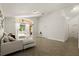 Open living area featuring herringbone floors and access to outdoor patio at 5451 Los Palma Vista Dr, Orlando, FL 32837