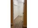 A walk-in closet featuring wood-style flooring and wire shelving at 5821 La Costa Dr # 108, Orlando, FL 32807