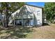 A multi-Gathering home with outdoor seating areas and stairs to the upper units at 5821 La Costa Dr # 108, Orlando, FL 32807