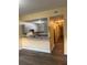 A spacious open-concept kitchen featuring a breakfast bar, stainless appliances, and granite countertops at 5821 La Costa Dr # 108, Orlando, FL 32807