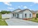 Charming single-story home featuring a well-manicured lawn and a convenient attached garage at 601 Swallow Ct, Apopka, FL 32712