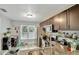 Modern kitchen boasting granite countertops, stainless steel appliances, and ample cabinet space at 601 Swallow Ct, Apopka, FL 32712