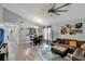 Open-concept living space with modern decor, lots of natural light, and plenty of room to spread out at 601 Swallow Ct, Apopka, FL 32712