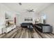 Bright and open living room with modern furnishings and wood-style flooring at 6566 S Goldenrod Rd # 82A, Orlando, FL 32822