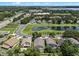 Overhead view of a suburban neighborhood with tranquil pond views and lush landscaping at 6720 Winder Lynne Ln, Orlando, FL 32819