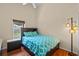 Comfortable bedroom featuring modern furnishings and hardwood floors at 6720 Winder Lynne Ln, Orlando, FL 32819