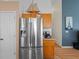 Modern stainless steel refrigerator with water dispenser and ice maker for a luxurious kitchen at 6720 Winder Lynne Ln, Orlando, FL 32819
