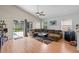 Cozy living room with access to the backyard pool and lush green lawn at 6720 Winder Lynne Ln, Orlando, FL 32819
