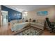 Inviting open living area with a view of dining room and a comfortable seating arrangement at 6720 Winder Lynne Ln, Orlando, FL 32819