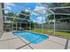 Enjoy the screened-in pool with blue water, a patio, and lush landscaping, perfect for relaxation and outdoor enjoyment at 6720 Winder Lynne Ln, Orlando, FL 32819