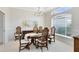 Elegant dining room features a traditional table and chairs with a lovely buffet at 740 Bear Creek Cir, Winter Springs, FL 32708