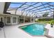 Enclosed pool boasts a generous deck and backyard, perfect for leisure at 740 Bear Creek Cir, Winter Springs, FL 32708