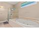 Beautiful bathroom offers both shower and bath options, great for unwinding after a long day at 800 Sterling Chase Dr, Port Orange, FL 32128