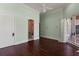 Bedroom with bathroom access and doors to the outside at 8542 Eden Park Rd, Orlando, FL 32810