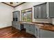 Office with built-in cabinets, drawers, and a desk at 8542 Eden Park Rd, Orlando, FL 32810