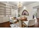 Spacious office with custom built-ins, stained glass window, and a chandelier at 8542 Eden Park Rd, Orlando, FL 32810