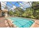 The pool offers brick pavers and a full enclosure for the best outdoor living and minimal maintenance at 8800 Torey Pines Ter, Orlando, FL 32819