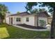 Charming single-story home with stone accents, landscaped garden, and a welcoming entrance at 10519 Wyndcliff Dr, Orlando, FL 32817