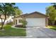 Charming home with a two-car garage, stone accents, and fresh landscaping, ready for move-in at 10519 Wyndcliff Dr, Orlando, FL 32817