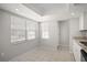 Eat-in kitchen area is well lit with natural light from large windows at 10519 Wyndcliff Dr, Orlando, FL 32817