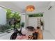 Inviting home gym featuring workout equipment, natural light, and outdoor views at 1150 Via Salerno, Winter Park, FL 32789