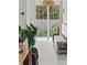 Inviting foyer featuring natural light, stylish bench seating and views of the outdoor greenery at 1150 Via Salerno, Winter Park, FL 32789