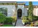 Inviting front entrance featuring manicured landscaping and a walkway at 11754 Waterstone Loop Dr, Windermere, FL 34786