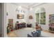 Bright playroom with a TV, toys, tile floors, and lots of natural light at 11754 Waterstone Loop Dr, Windermere, FL 34786