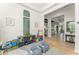 This playroom is bright and inviting, featuring neutral decor and plenty of storage for toys at 11754 Waterstone Loop Dr, Windermere, FL 34786