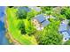 Aerial view of the backyard with patio looking out over the lake at 1212 Bradwell Dr, Orlando, FL 32837