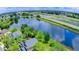Community aerial view of the lake with fountain and highway at 1212 Bradwell Dr, Orlando, FL 32837