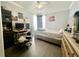 Bedroom featuring desk space, large window, and light-colored walls at 1212 Bradwell Dr, Orlando, FL 32837