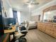 Bright bedroom featuring hardwood floors, a ceiling fan, and comfortable furniture at 1212 Bradwell Dr, Orlando, FL 32837