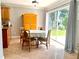 Cozy dining area with tile floors, neutral wall paint, and natural light at 1212 Bradwell Dr, Orlando, FL 32837