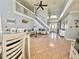 Bright, open living room with high ceilings, a staircase and tile flooring at 1212 Bradwell Dr, Orlando, FL 32837