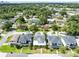 An aerial view of a neighborhood, showcasing tree-lined streets and well-maintained homes at 1410 W New Hampshire St, Orlando, FL 32804