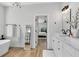 Stylish bathroom features a soaking tub, dual vanity, and access to the bedroom and glass shower at 1410 W New Hampshire St, Orlando, FL 32804