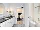 Well-designed bathroom with black and white tile, tub and shower, and view of exercise room at 1410 W New Hampshire St, Orlando, FL 32804