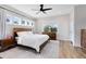 Tranquil bedroom with a wood accent furniture, multiple windows, and neutral decor at 1410 W New Hampshire St, Orlando, FL 32804