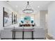 Cozy living room featuring stylish decor, a wall-mounted television, and an open floor plan at 1410 W New Hampshire St, Orlando, FL 32804