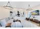 Spacious living room featuring stylish lighting, modern artwork, and a comfortable sectional sofa at 1410 W New Hampshire St, Orlando, FL 32804