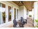 Inviting outdoor patio with brick flooring, ceiling fan and comfortable seating area at 1410 W New Hampshire St, Orlando, FL 32804